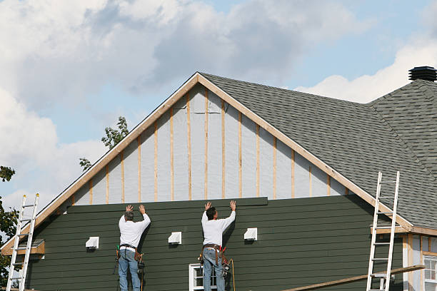 Professional Emergency Siding Repair technician working in Fairview, NC